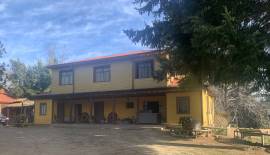 Gran Parcela con casa patronal a pasos de la ruta