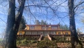 Gran Parcela con casa patronal a pasos de la ruta